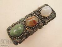 Old handmade lighter case with stones