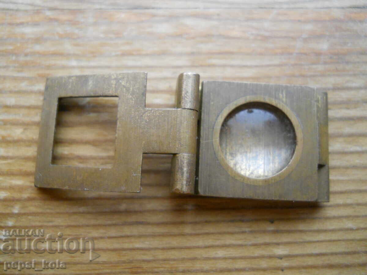 Auction  Antique folding magnifying glass