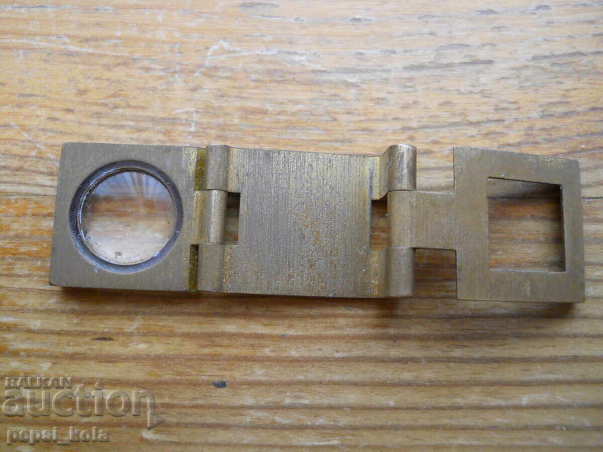 Delivery of Antique folding magnifying glass