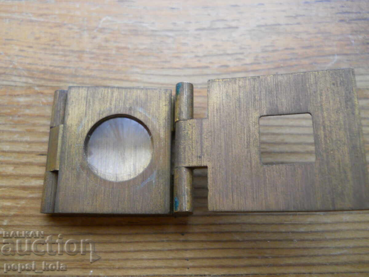 Auction Antique folding magnifying glass Auction Antique folding magnifying glass