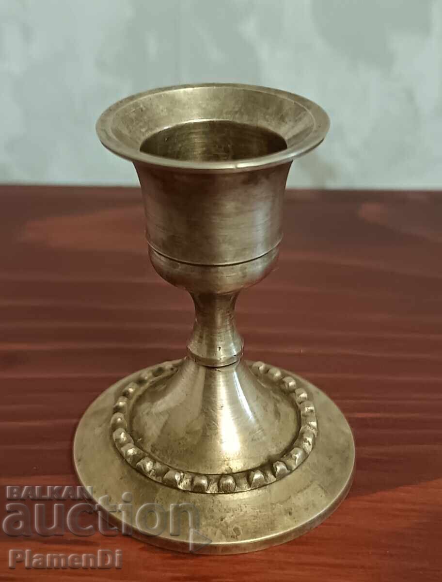 Auction  Old bronze candlestick