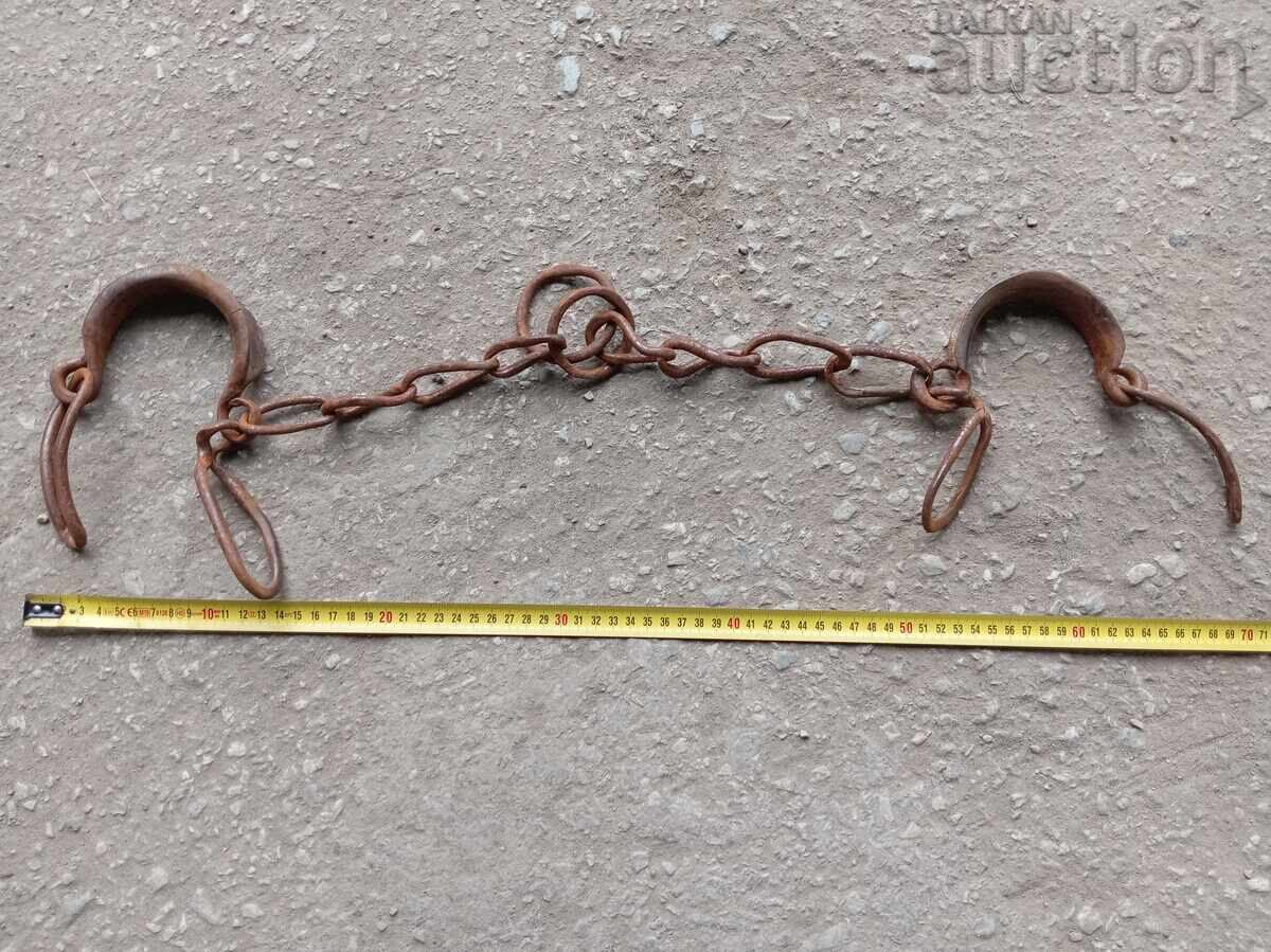 Old hand-forged buckles, chains, shackles, shackles Old hand-forged buckles, chains, shackles, shackles