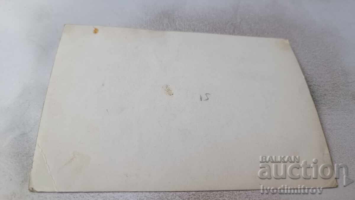 Fotografie cu trei fotbaliști ținând un trofeu cu preț 2.65 BGN | € 1.35