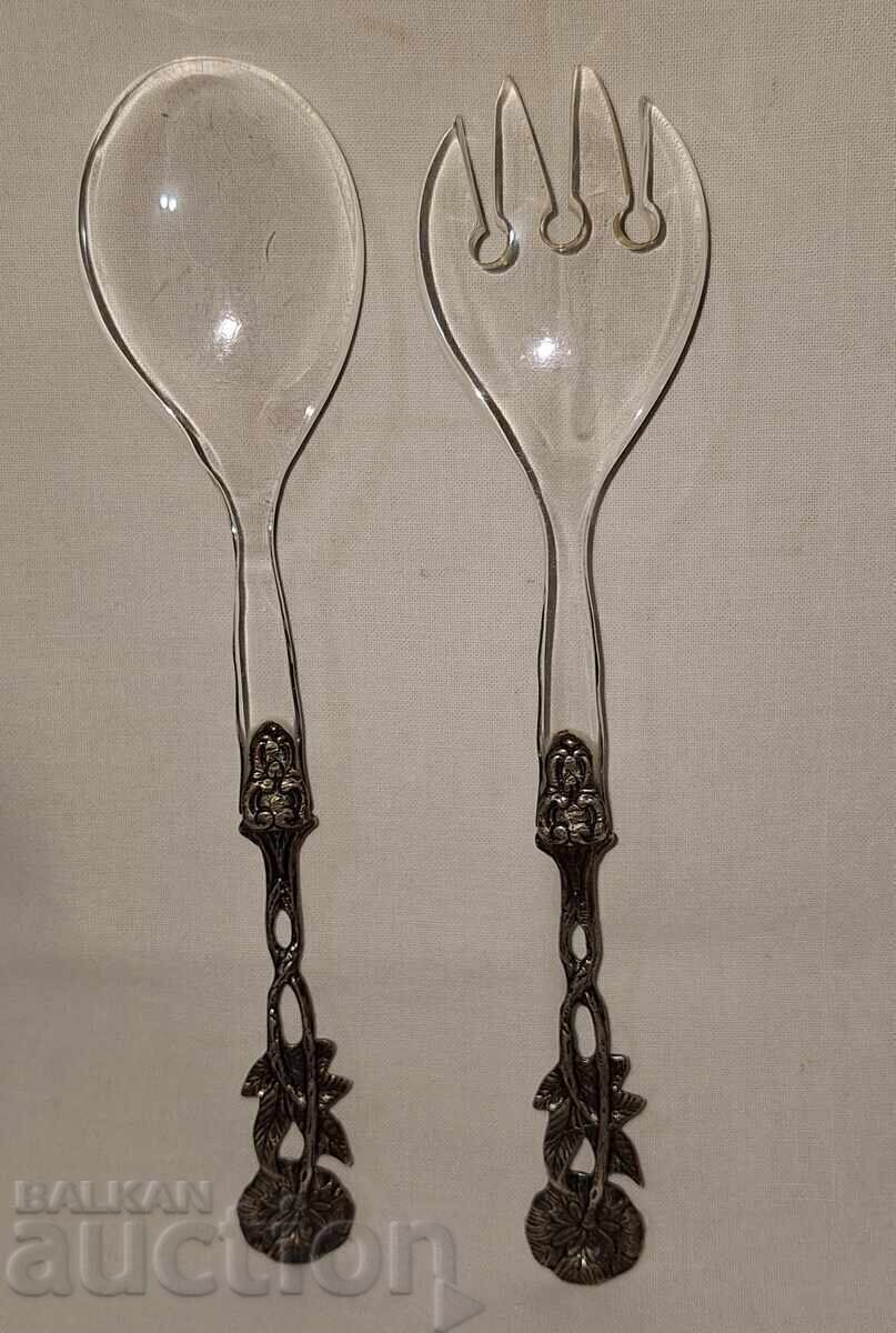 Delivery of Old cutlery set with silver handles with a rose Delivery of Old cutlery set with silver handles with a rose