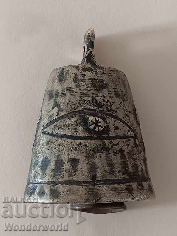 Old Revival-era cauldron with an eye and a clover in it