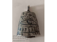 Old Revival-era cauldron with an eye and a clover in it