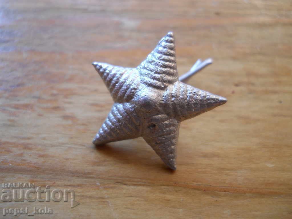 Μεγάλο αστέρι από επωμίδα αξιωματικού (συνταγματάρχη)