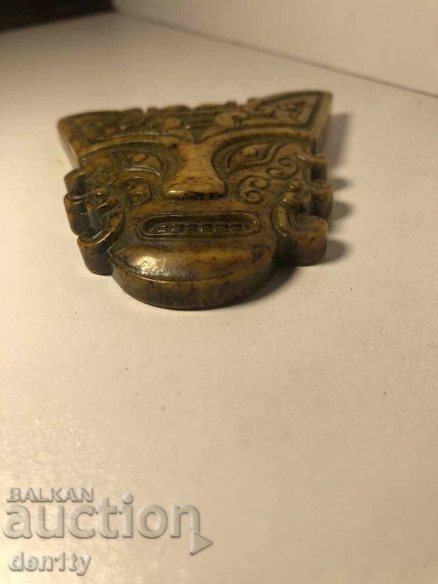 издълбана каменна маска с цена 25.00 лв. | € 12.78