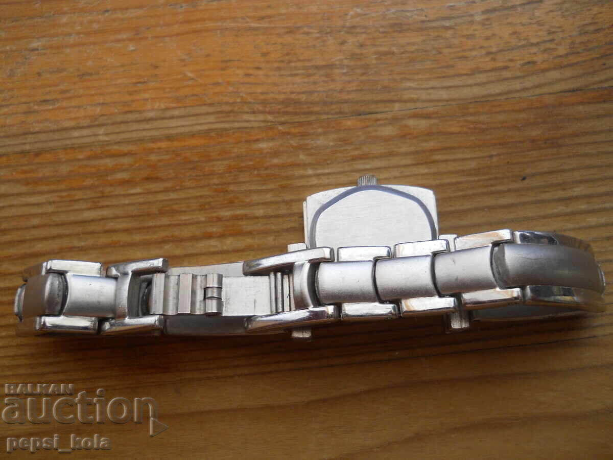 Licitație Ceas de damă cuarț tip brățară Licitație Ceas de damă cuarț tip brățară