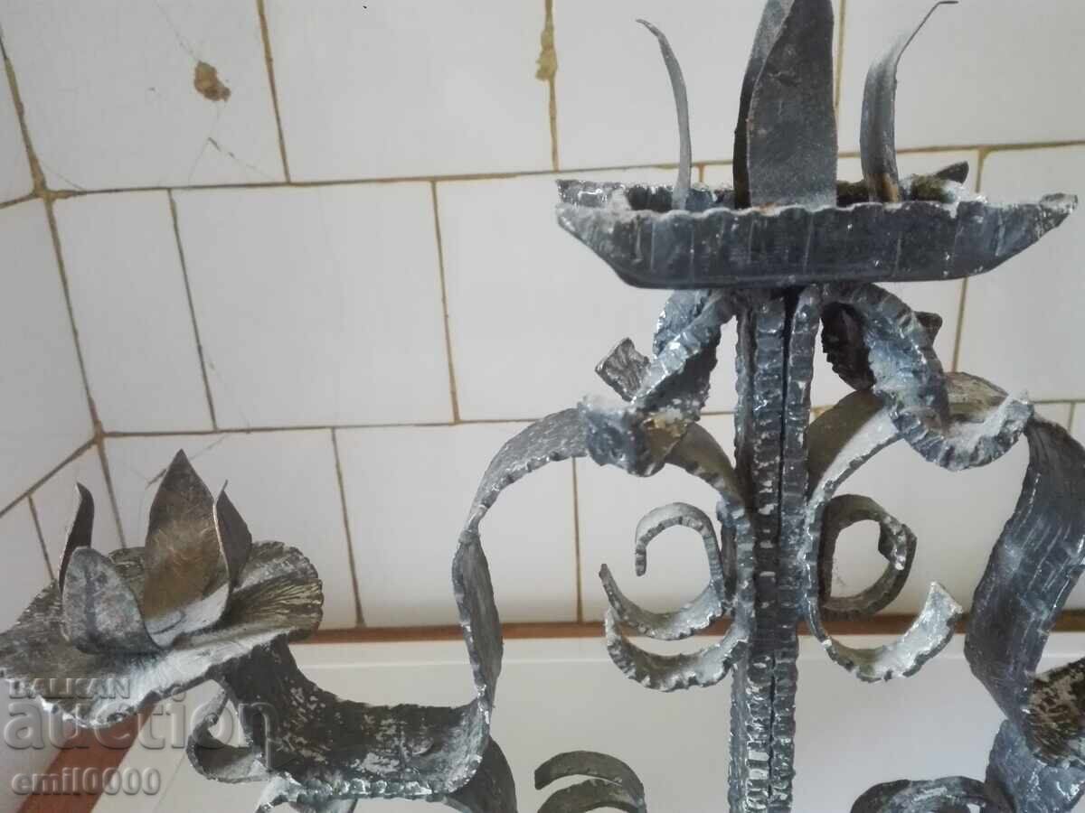 Delivery of Old metal candlestick trio Delivery of Old metal candlestick trio