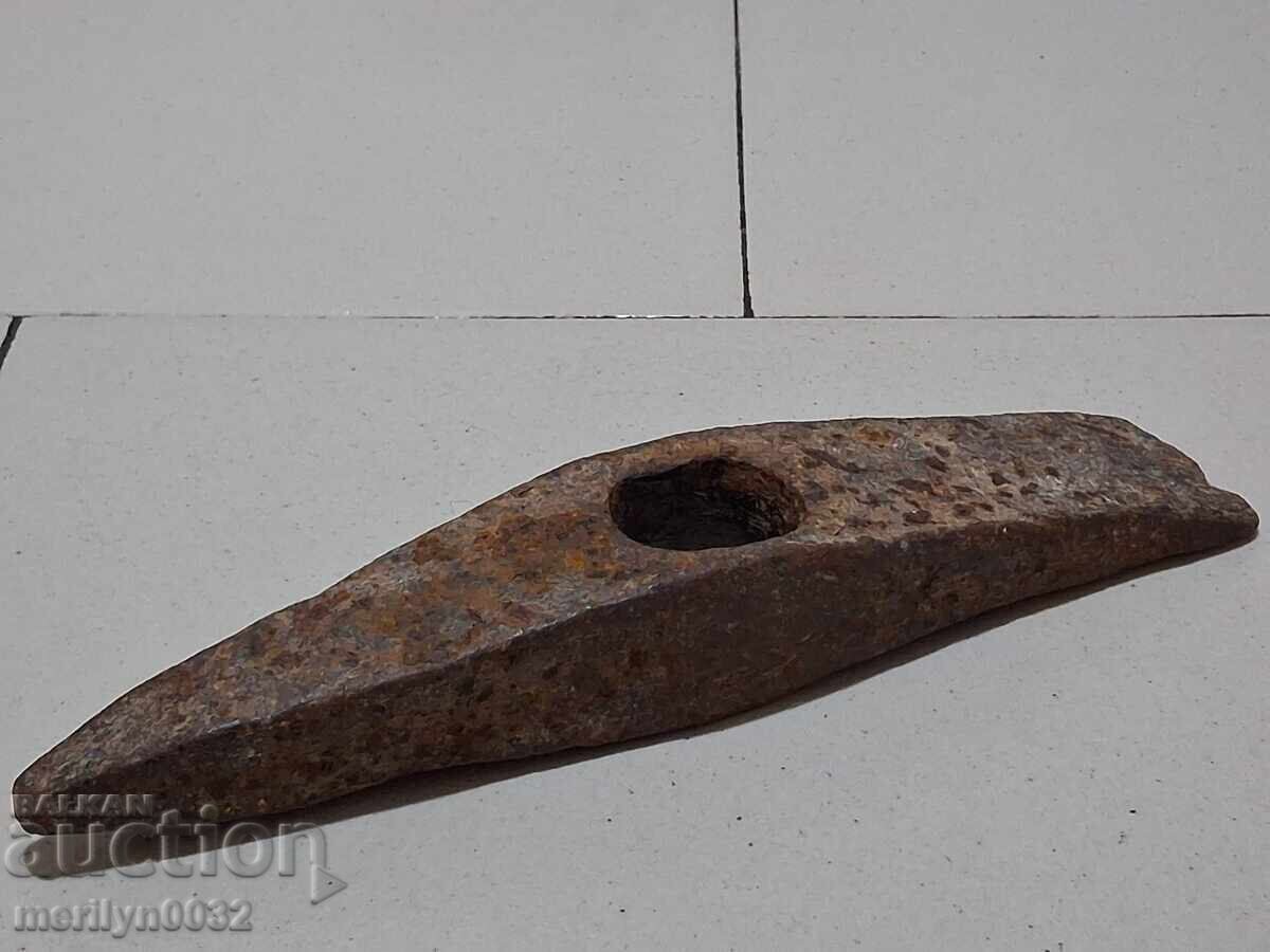 Old mason's hammer, tool, pickaxe