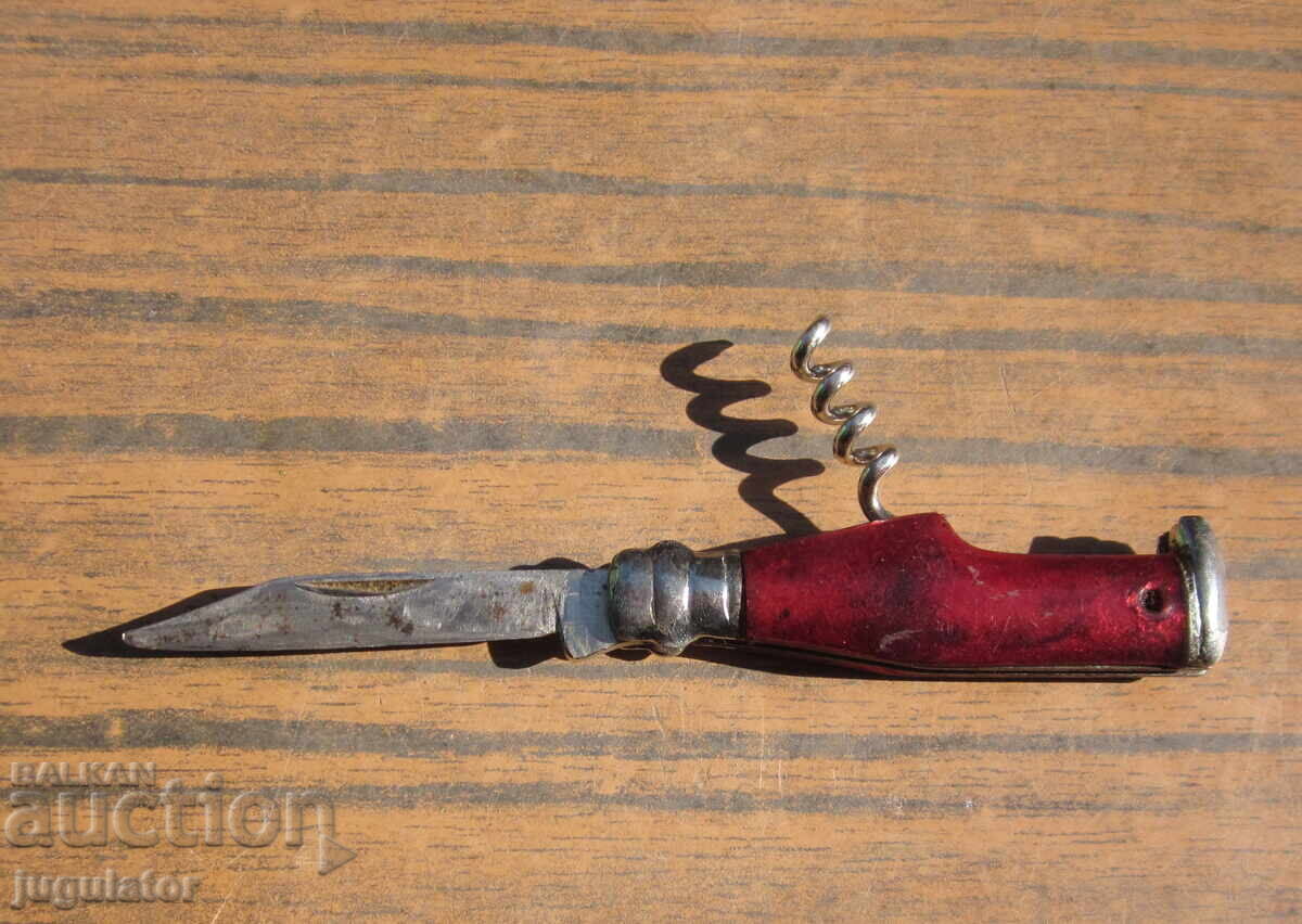 Auction  Old small pocket knife with corkscrew from socialism