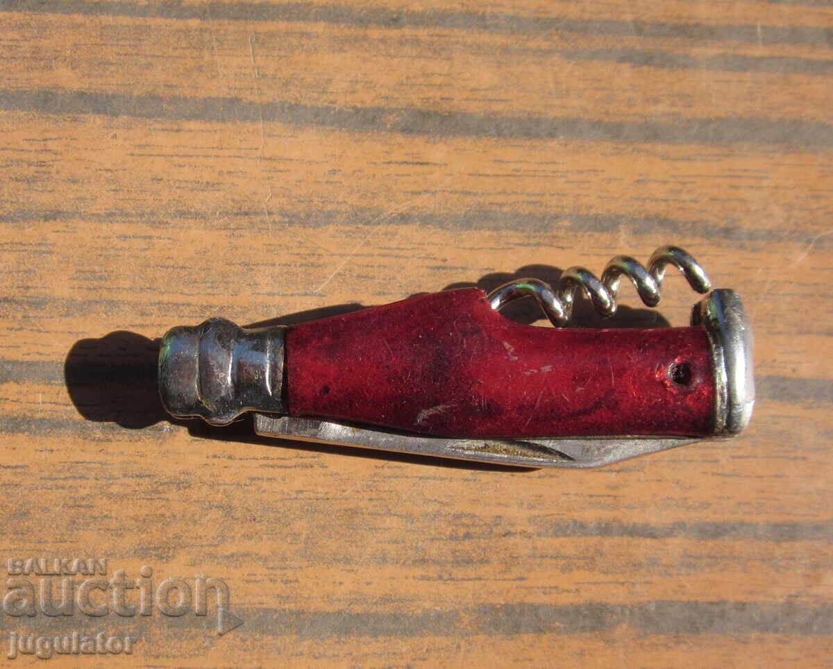 Old small pocket knife with corkscrew from socialism