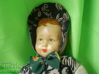 Păpușă veche, față din papier-mâché, corpul din material textil