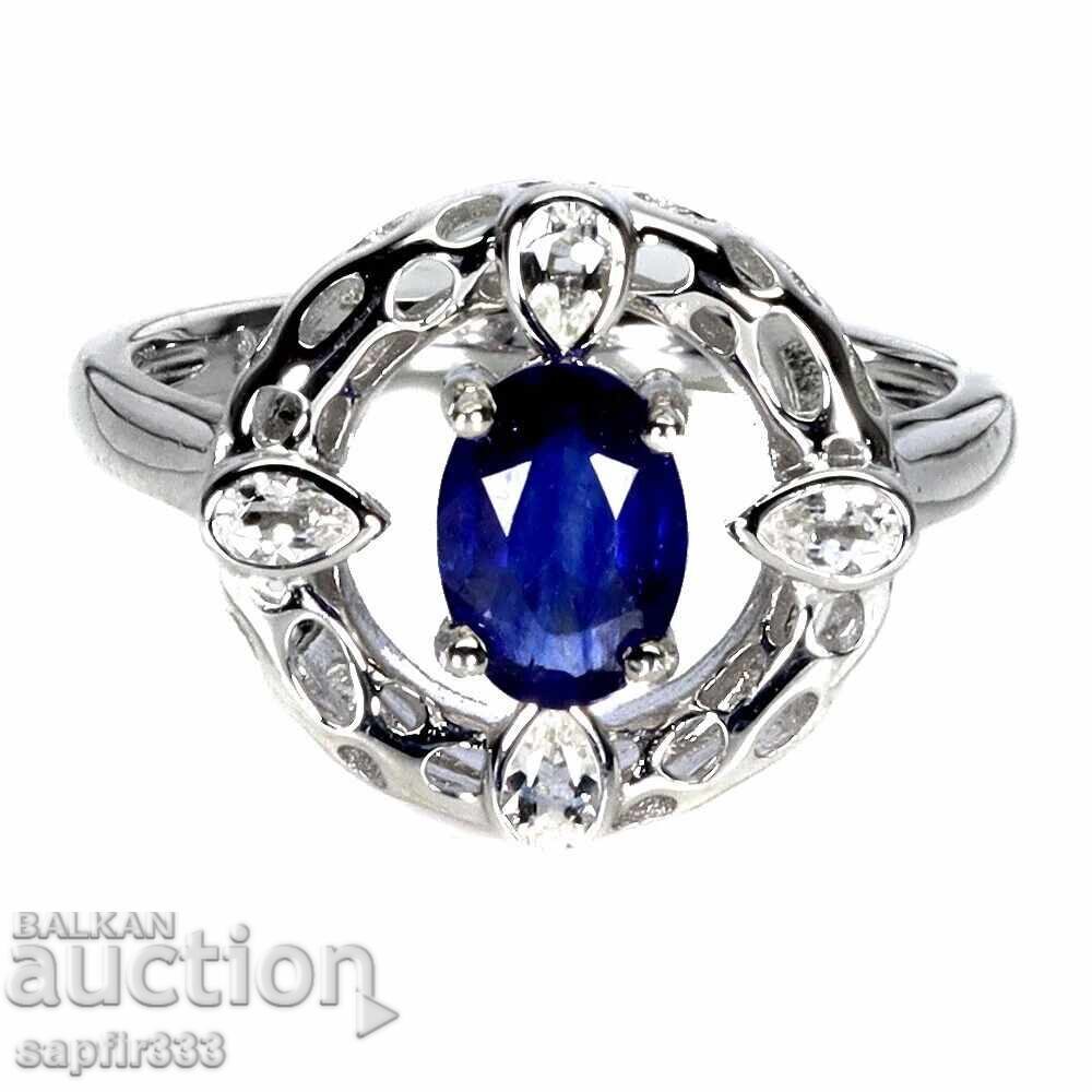 Designer ring with natural sapphire and white topazes