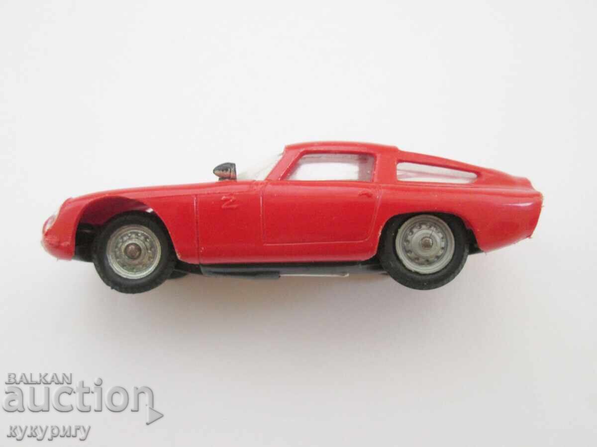 Delivery of Old plastic slot car toy Alfa Romeo Giulia TZ