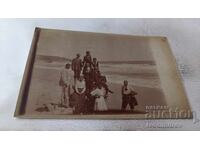 Photo Men and women on the beach