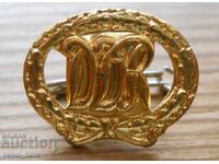 Gold-plated sports badge "GDR" - 1960
