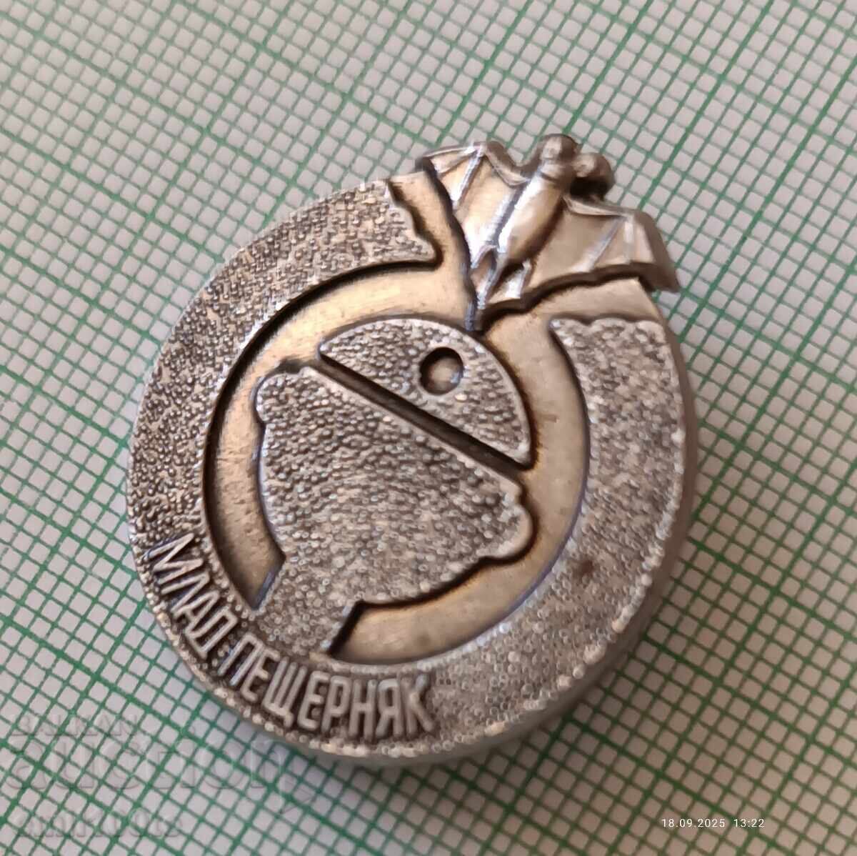 Auction  Badge - Young Caveman