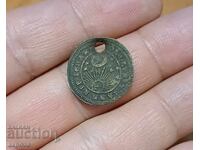 Стара монета ползвана за накит