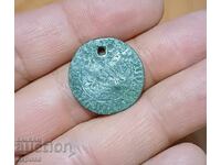 Стара монета ползвана за накит