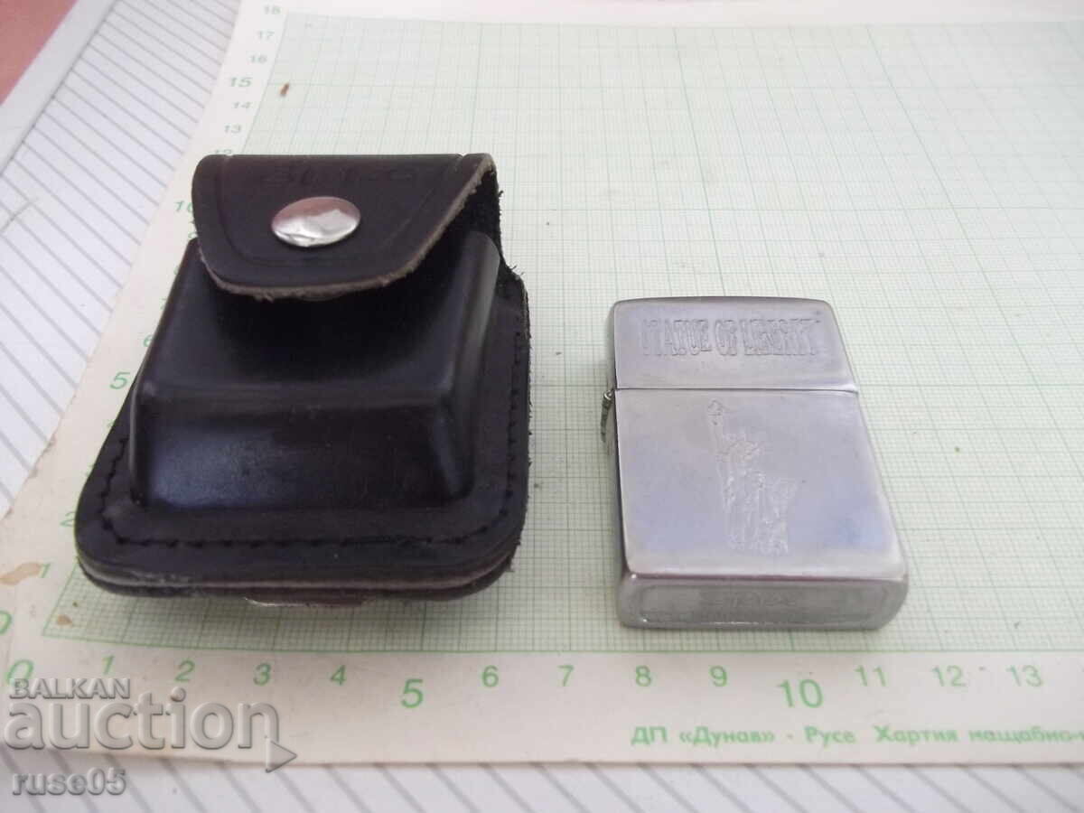 Zippo Lighter and Zippo Lighter Case Brown with Clip with price 50.00 BGN | € 25.56