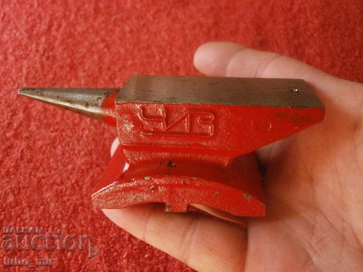 Old jewelry - watchmaking anvil