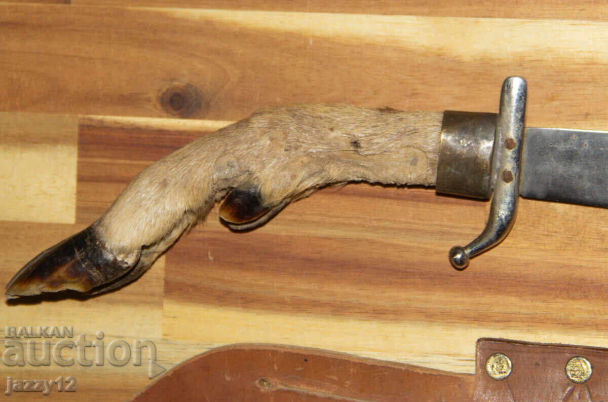 Delivery of Solid hunting knife with a hoof handle