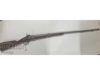 Veche pușcă capsulă