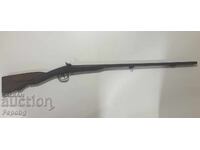 Veche pușcă capsulă