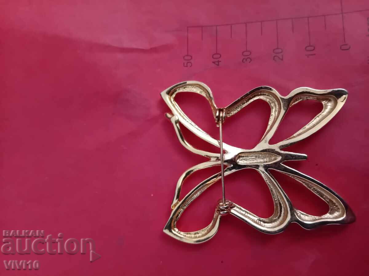 Auction  Antique brooch with stones, butterfly