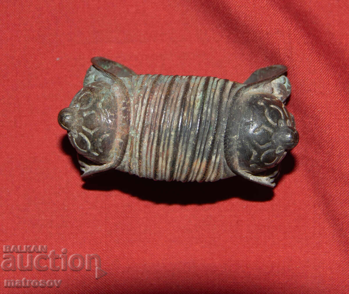 Old traditional bronze bracelet jewelry slingshot