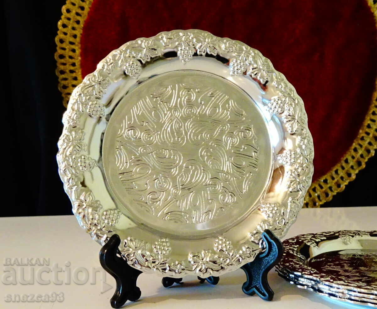 Silver-plated plate, embossed grapes.