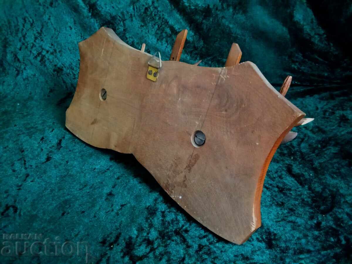 Auction  Key holder, wood carving, oxen