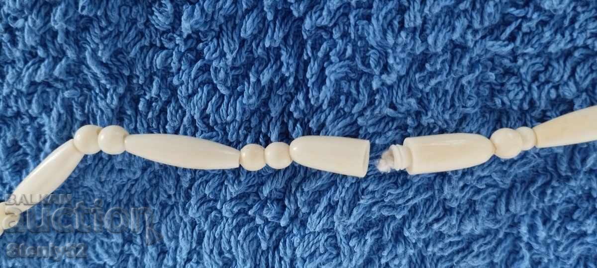 Δημοπρασία Γεραν με μενταγιόν από ελεφαντόδοντο, βάρος 26.92 γρ Δημοπρασία Γεραν με μενταγιόν από ελεφαντόδοντο, βάρος 26.92 γρ