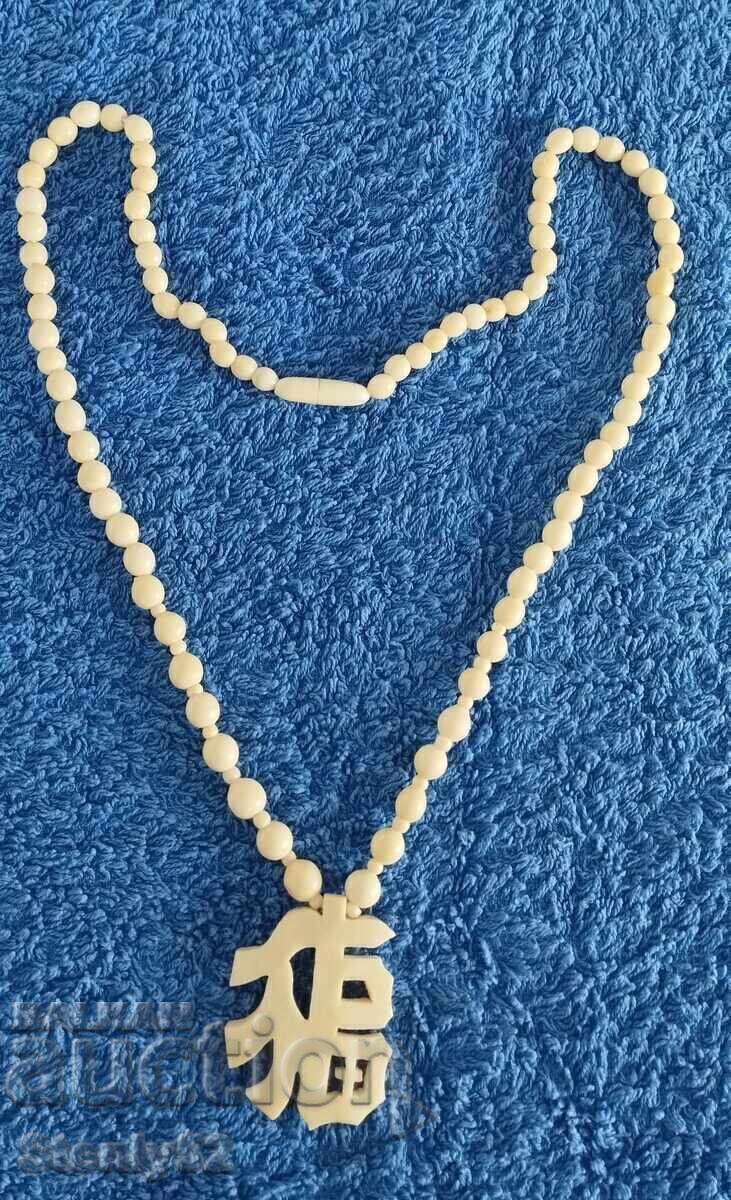 Κολιέ με μενταγιόν από ελεφαντόδοντο, βάρος 22.93 γρ με τιμή 90.00 BGN | € 46.02 Κολιέ με μενταγιόν από ελεφαντόδοντο, βάρος 22.93 γρ με τιμή 90.00 BGN | € 46.02