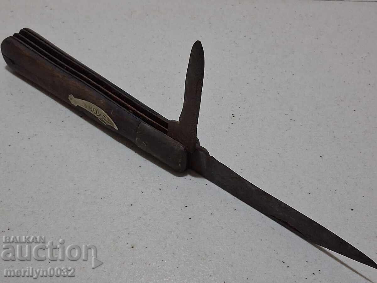 Auction  Old Comet knife leg