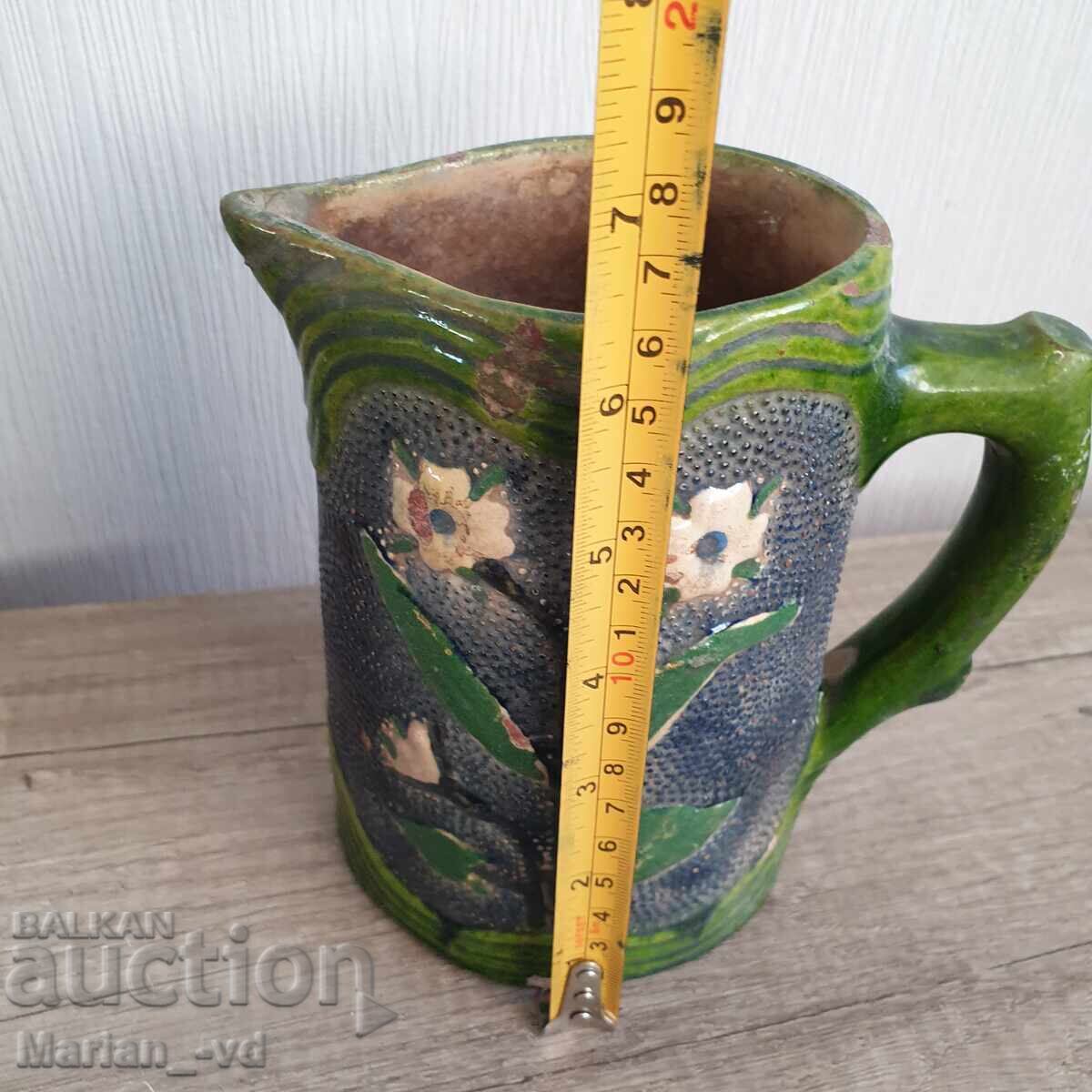 Auction  Old ceramic jug