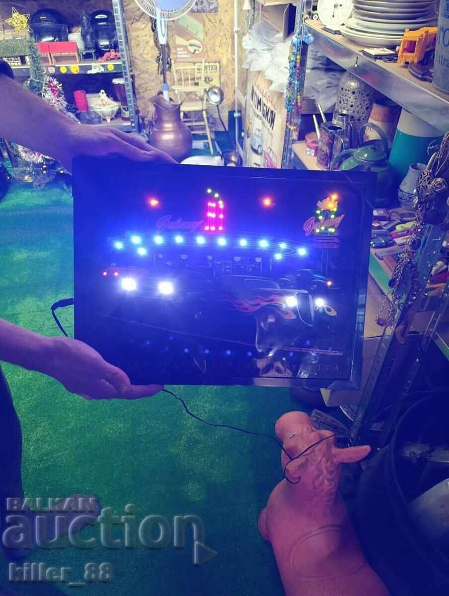 Φωτεινή πινακίδα με ρετρό αυτοκίνητα