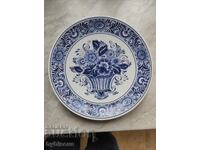 Flower basket on a Dutch Delft blue dinner plate