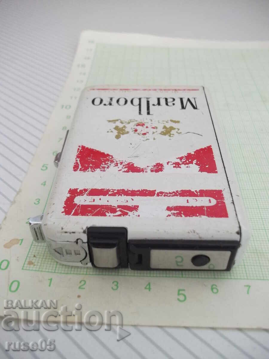 Livrarea Brichetă tabacheră "Marlboro" Livrarea Brichetă tabacheră "Marlboro"