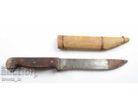 Antique knife with a wooden sheath