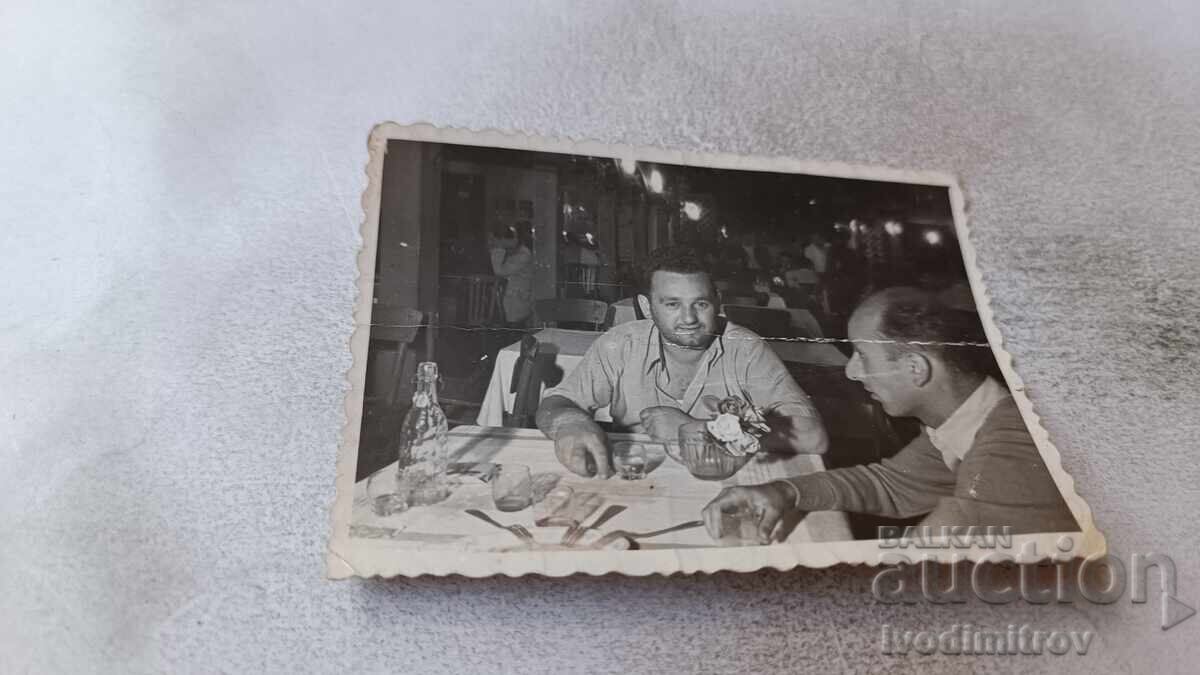 Photo of Two Men in Chaika Restaurant