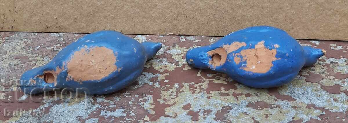 Delivery of Two old ceramic whistles in the shape of birds