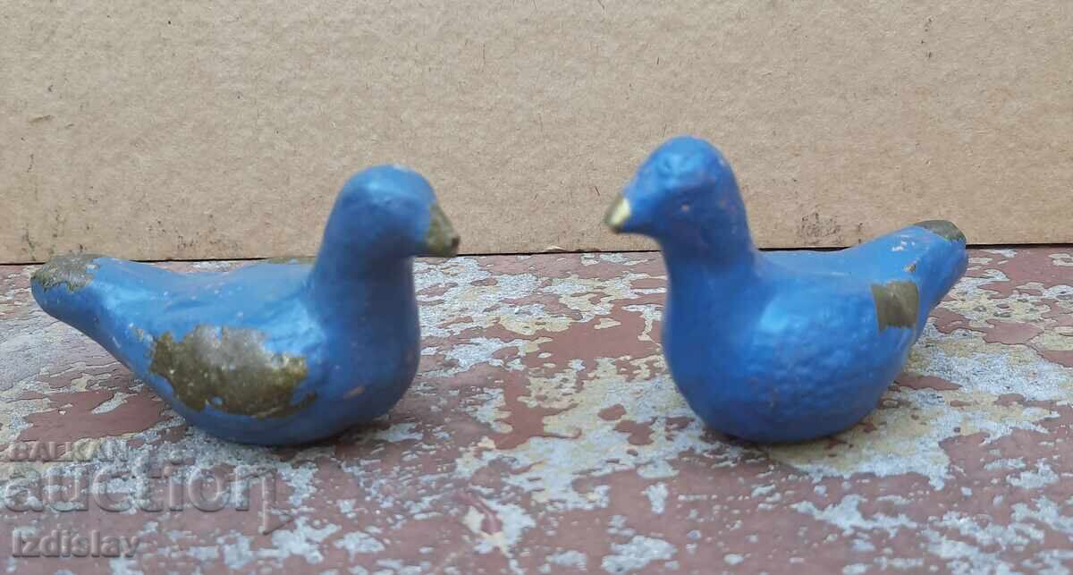 Two old ceramic whistles in the shape of birds