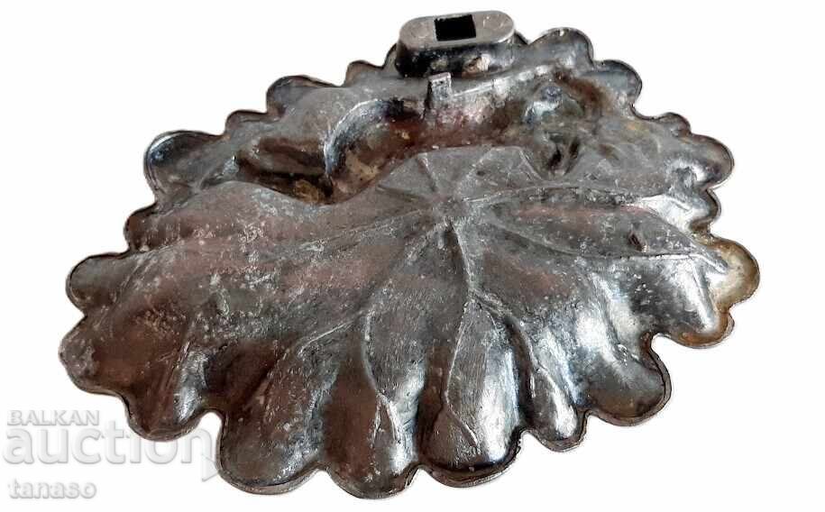 Livrarea Cenușar antic din cupru cu basorelief - fată culcată