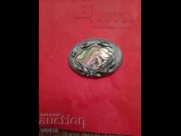 Antique brooch with mother-of-pearl