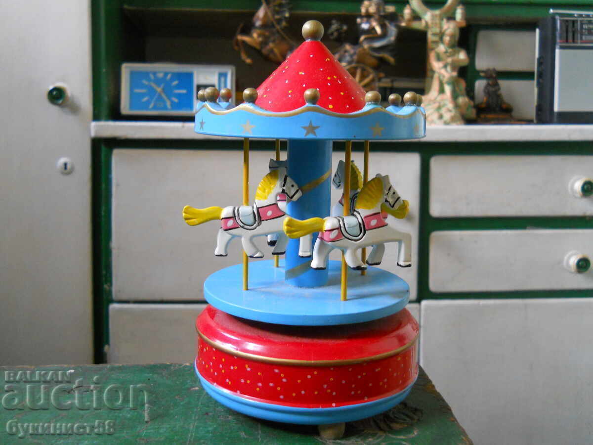 Mechanical musical children's toy - carousel