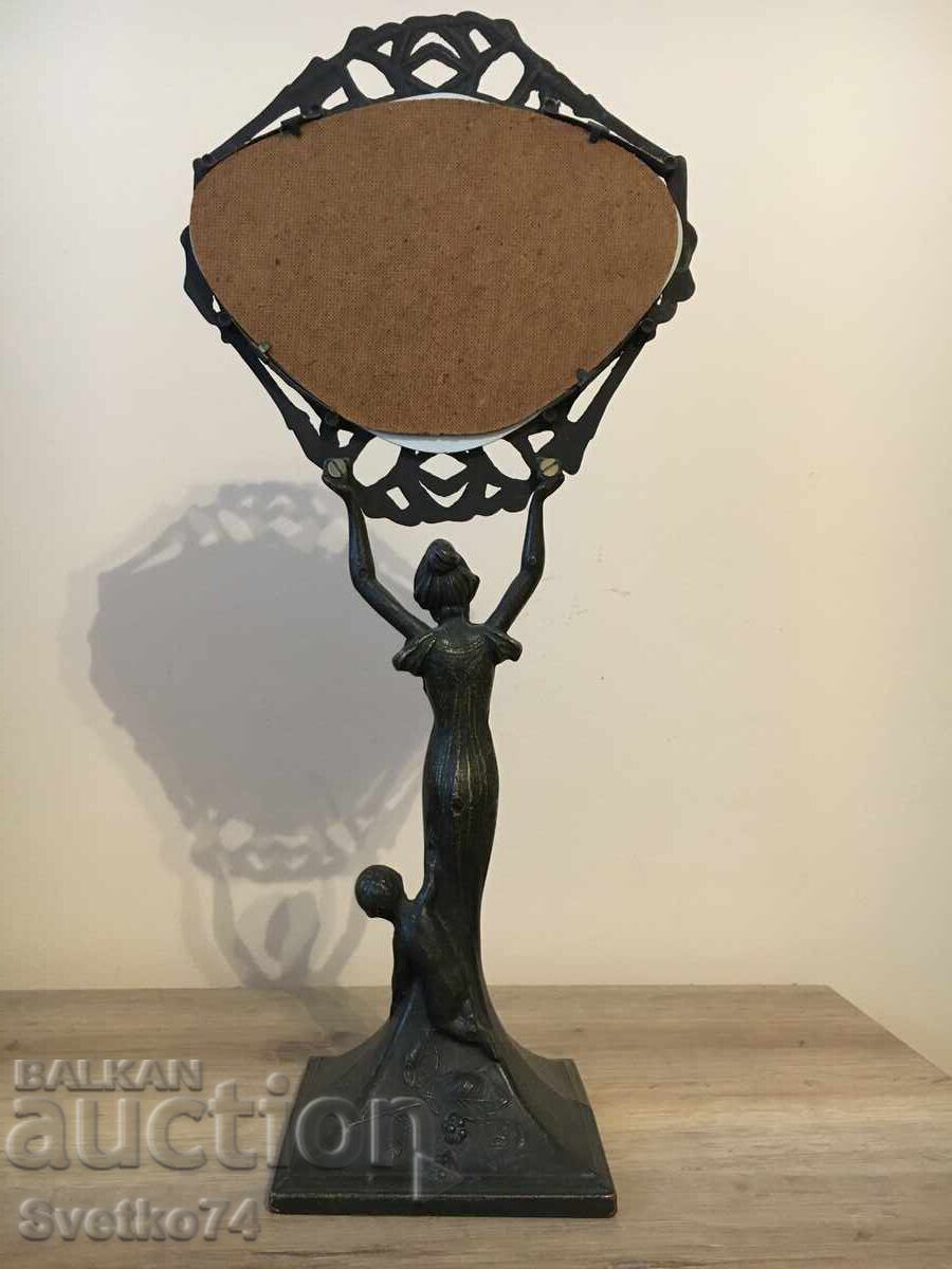 Delivery of Art Deco massive bronze mirror