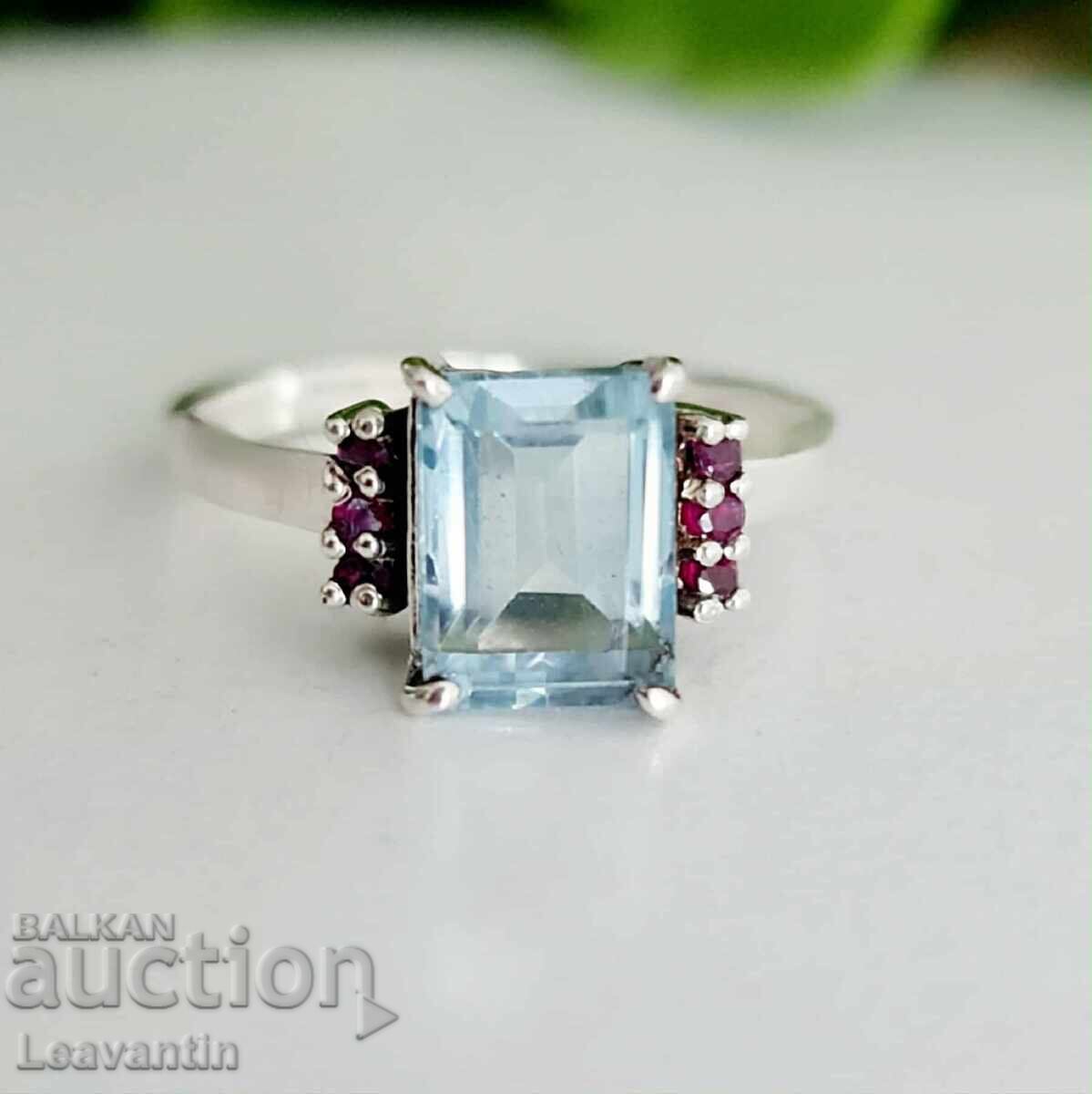 Ασημένιο δαχτυλίδι με μπλε τοπάζι και ρουμπίνια με τιμή 86.00 BGN | € 43.97